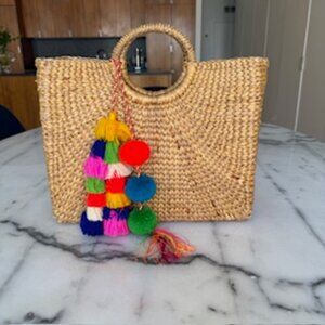 JADEtribe straw tote with detachable pompoms